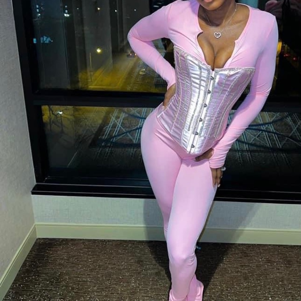 Pink stretchy romper with corset